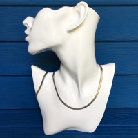 Комплект из серебряных колье и браслета