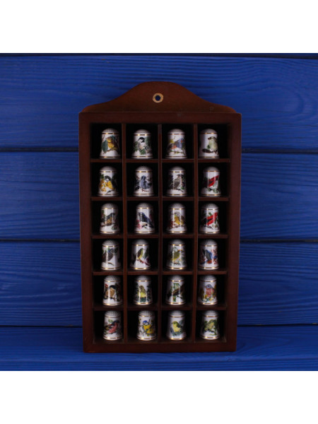 Комплект 24 из 25 наперстков коллекционной серии Songbirds of the World от Franklin Porcelain. Декорированы золотом 24 К.