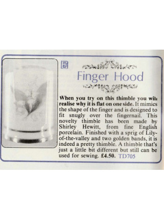 Коллекционный наперсток Finger Hood в форме пальца с изображением ландышей, выпущенный в апреле 1987 года Thimble Craft специально для Thimble Collector Guild и Scotland Direct
