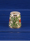 Коллекционный фарфоровый наперсток Perfumed Thimble, выпущенный в 1988 году Thimble Craft специально для Thimble Collector Guild и Scotland Direct. Декорирован золотом 22К.