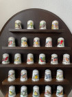 Полный комплект из 25 винтажных наперстков коллекционной серии Songbirds of the World от Franklin Porcelain. Вручную декорированы золотом 24 К