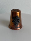 Очень редкий коллекционный наперсток из меди Star of David (Звезда Давида), изготовленный в 1986 году Felix Morel специально для Thimble Collector Guild