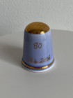 Коллекционный наперсток Royal Blue & Gold, выпущенный в апреле 2006 года специально для Thimble Collector Guild к 80-летию Елизаветы Второй